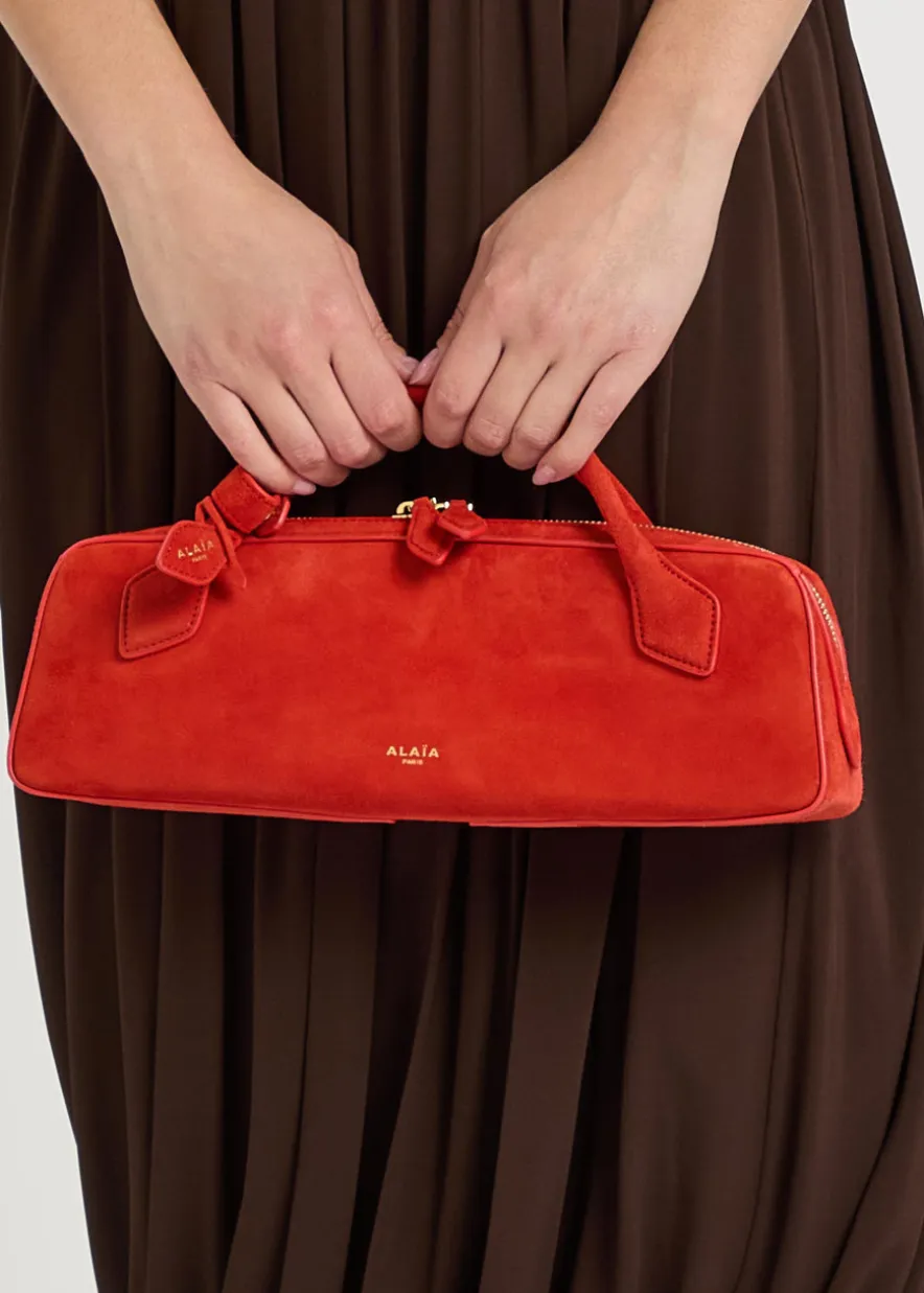 Le Teckel suede clutch