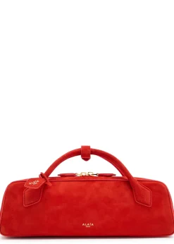 Le Teckel suede clutch