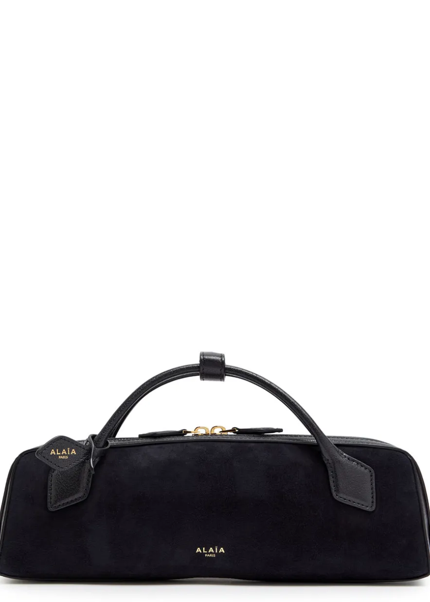 Le Teckel suede clutch