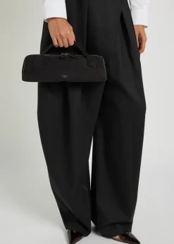 Le Teckel suede clutch