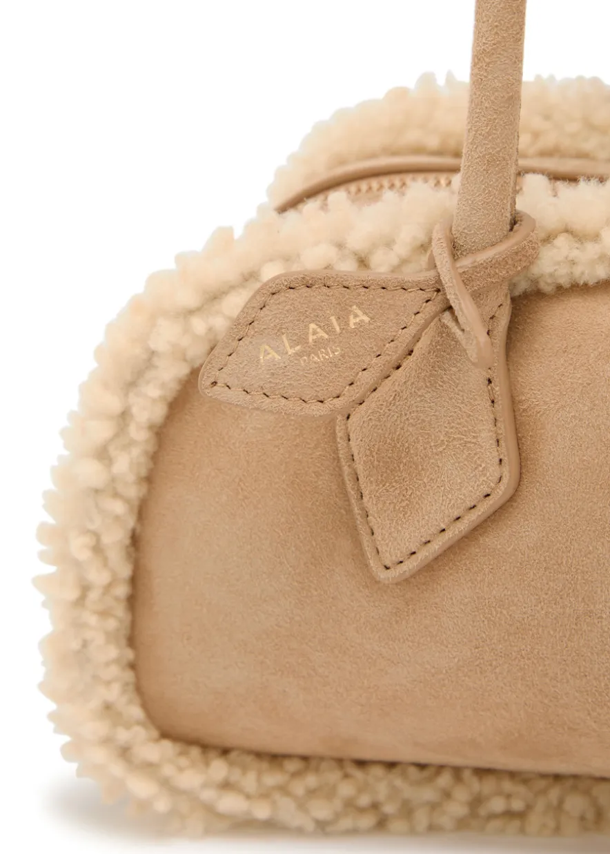 Le Teckle medium shearling-trimmed suede shoulder bag