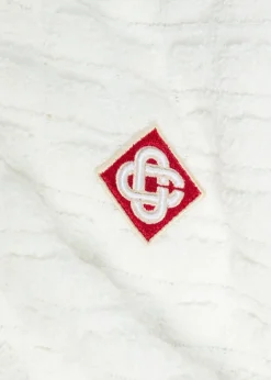 Logo-appliquéd bouclé polo shirt
