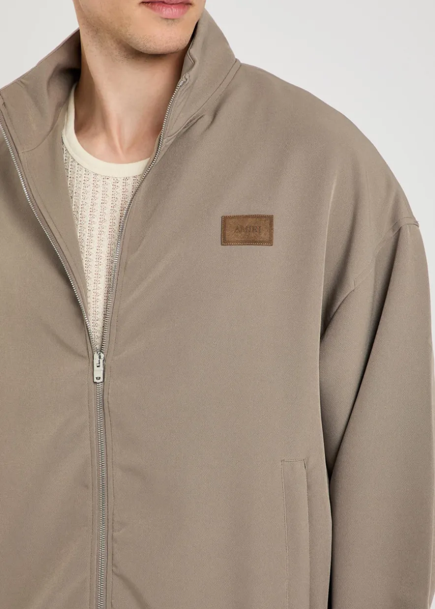 Logo-appliquéd cady track jacket