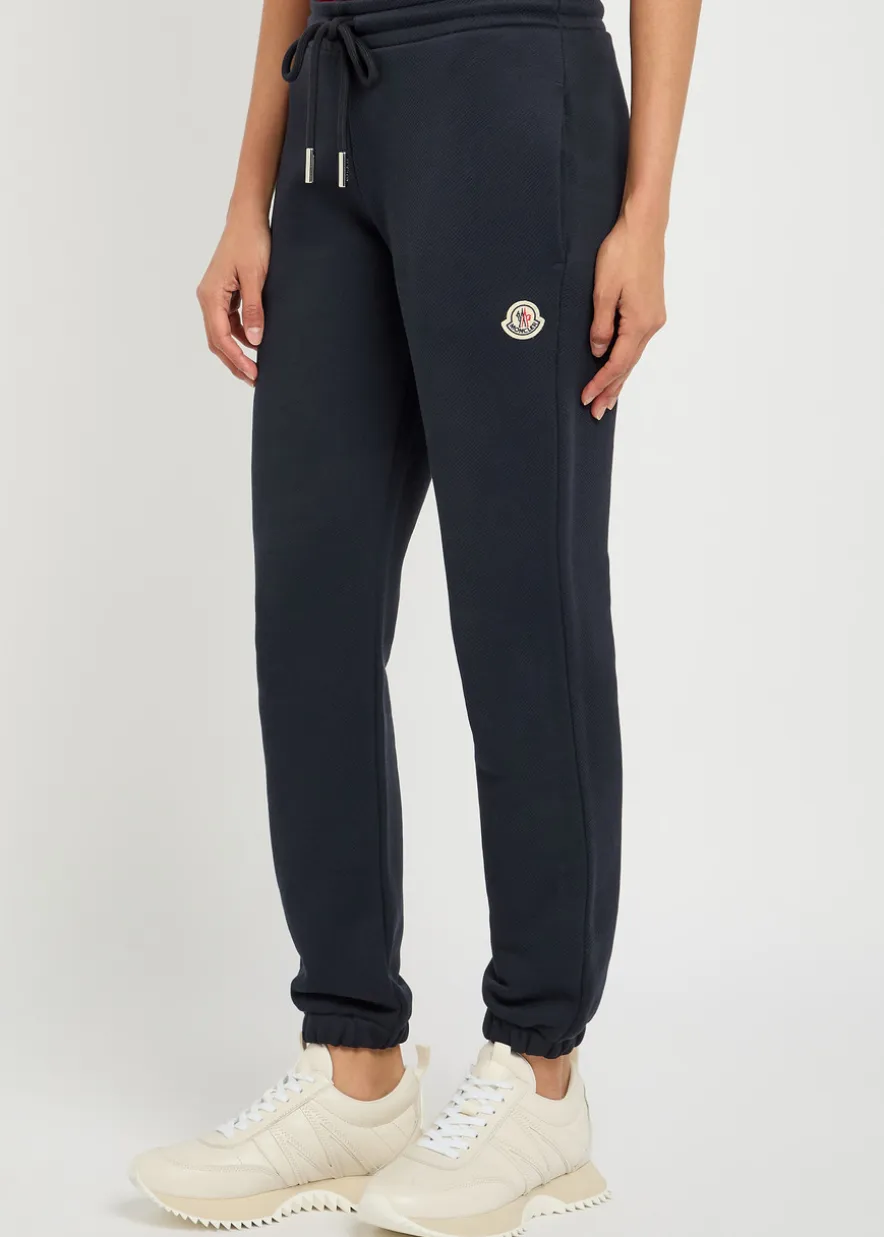 Logo-appliquéd cotton-blend sweatpants