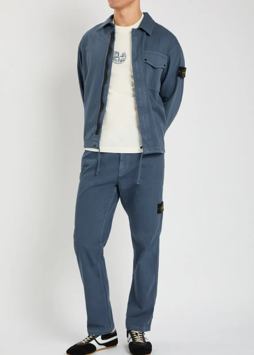 Logo-appliquéd herringbone cotton trousers