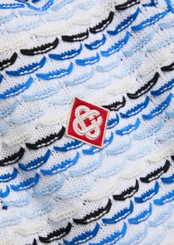 Logo-appliquéd patterned cotton-knit polo jumper