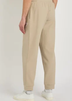 Logo-appliquéd piqué cotton-blend sweatpants