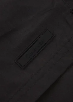 Logo-appliquéd shell swim shorts