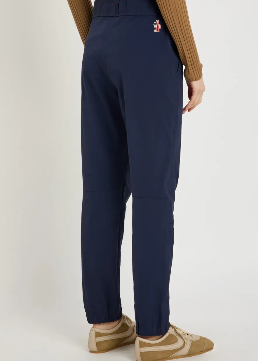 Logo-appliquéd stretch-polyamide trousers