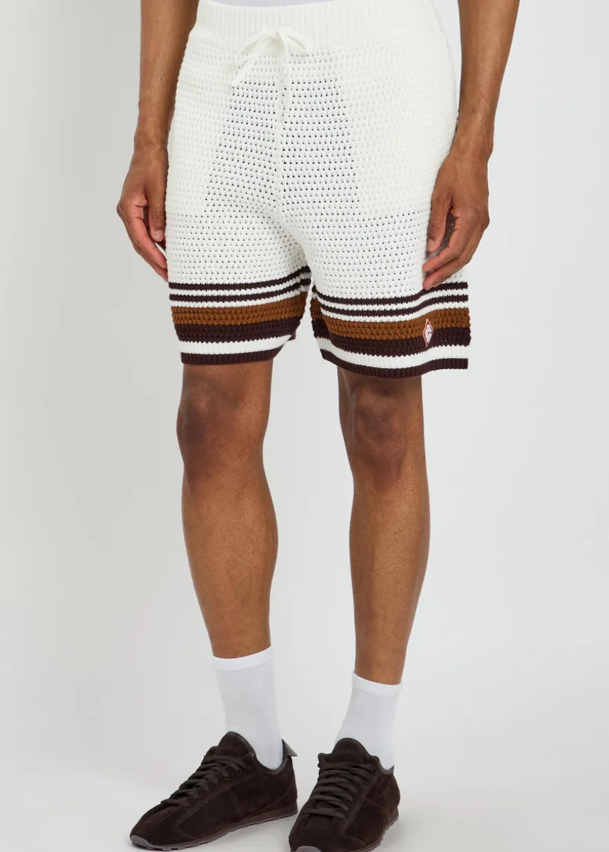 Logo-appliquéd striped crochet cotton-knit shirt