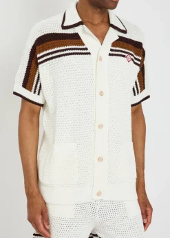 Logo-appliquéd striped crochet cotton-knit shirt