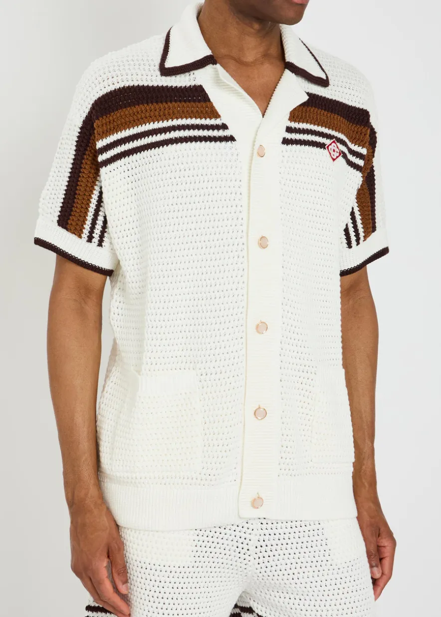 Logo-appliquéd striped crochet cotton-knit shirt