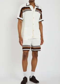 Logo-appliquéd striped crochet cotton-knit shirt