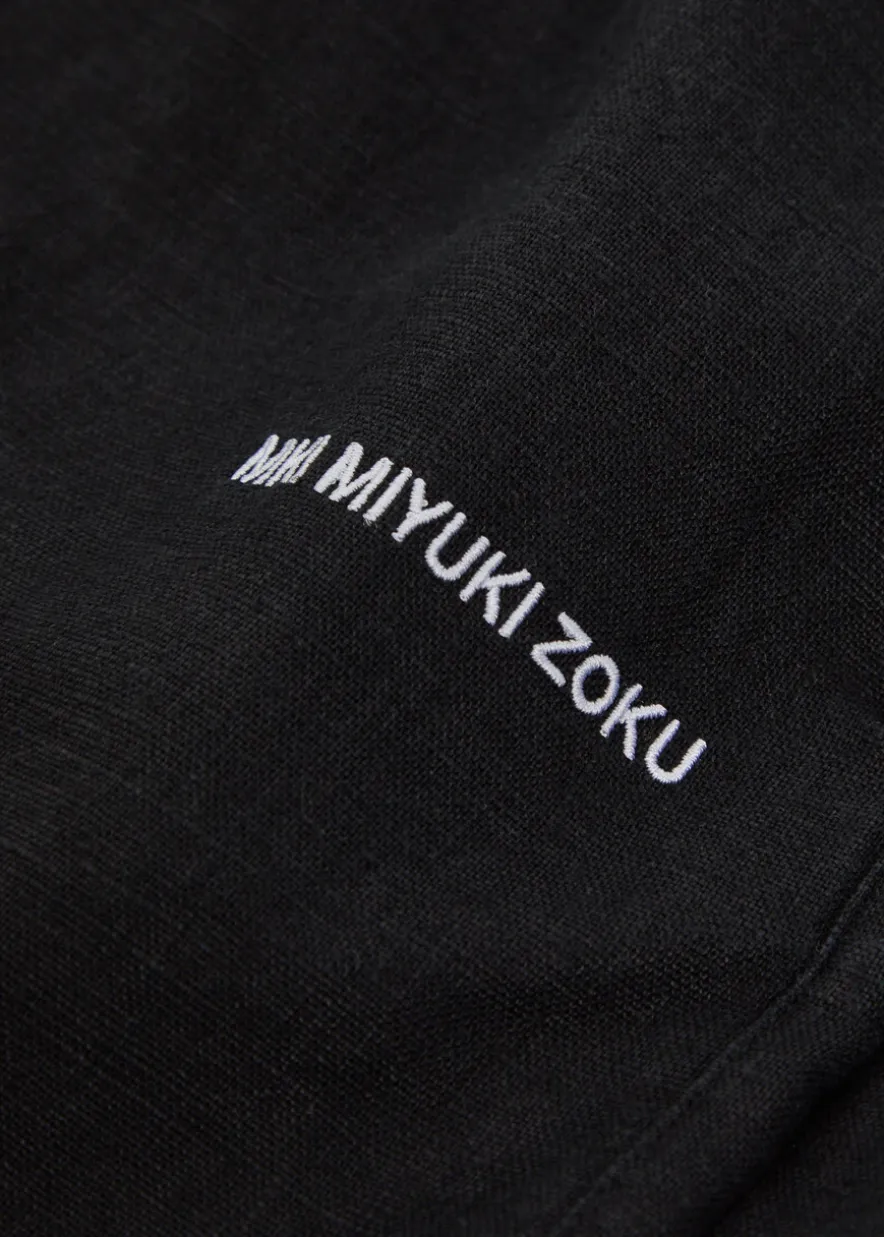 Logo-embroidered linen swim shorts