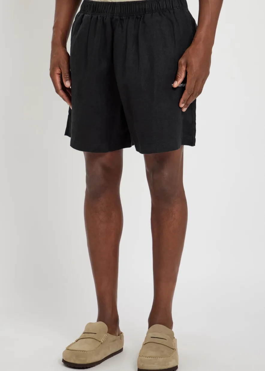 Logo-embroidered linen swim shorts