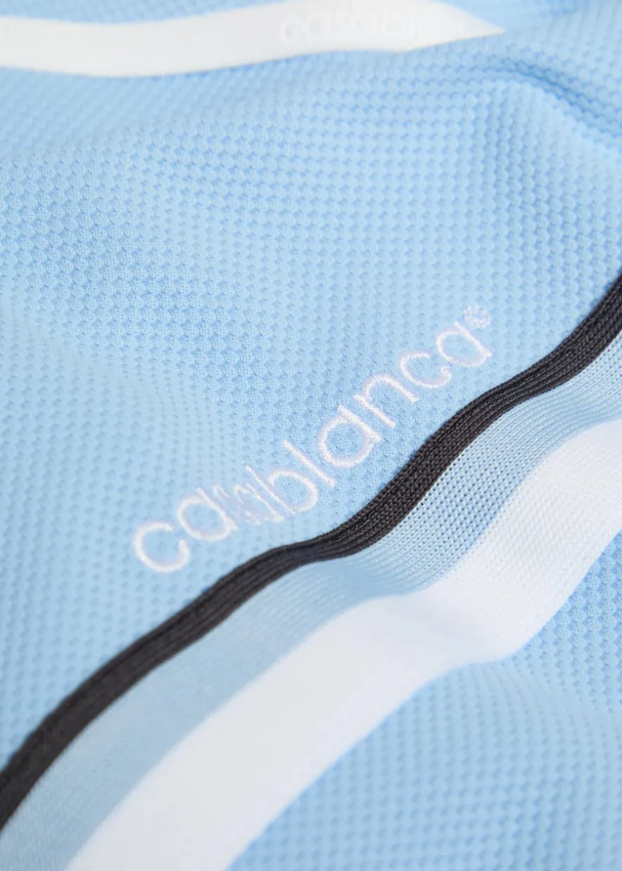 Logo-embroidered panelled piqué woven track jacket