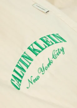 Logo-embroidered pinstriped cotton shorts