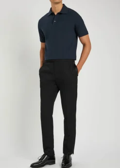 Logo-embroidered piqué cotton-blend polo shirt