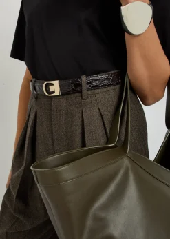 Logo-engraved crocodile glossed leather belt