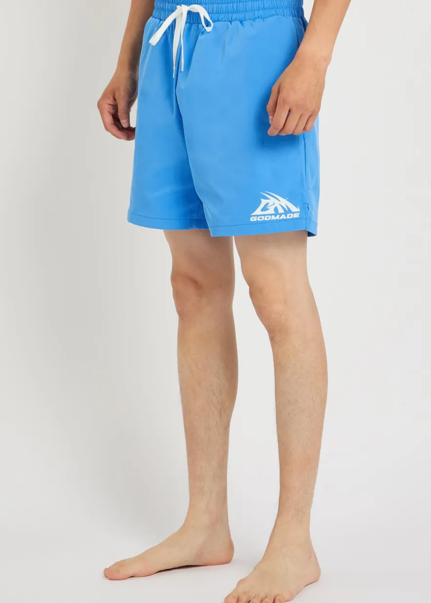 Logo-print cotton swim shorts