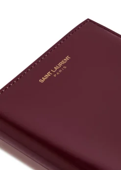 Logo-stamped patent leather passport holder