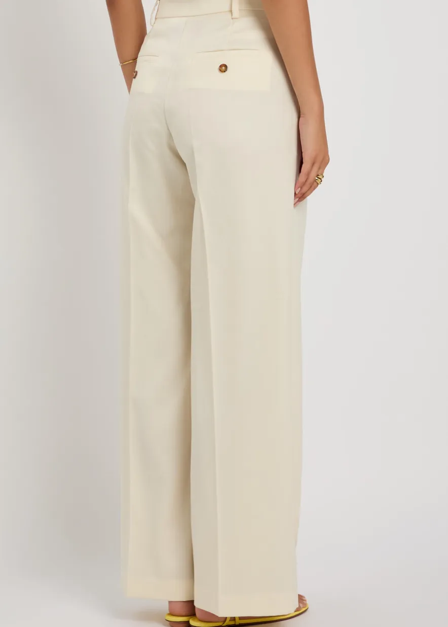 Loose pleated wide-leg wool trousers
