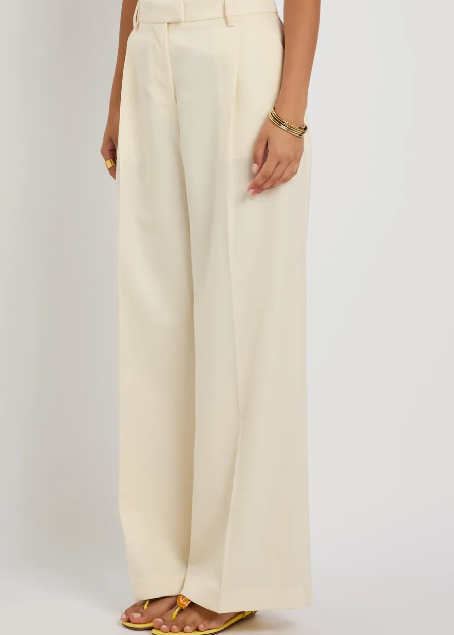 Loose pleated wide-leg wool trousers