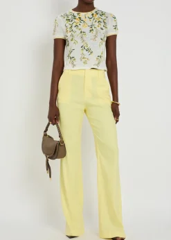 Lula flared-leg linen-blend trousers