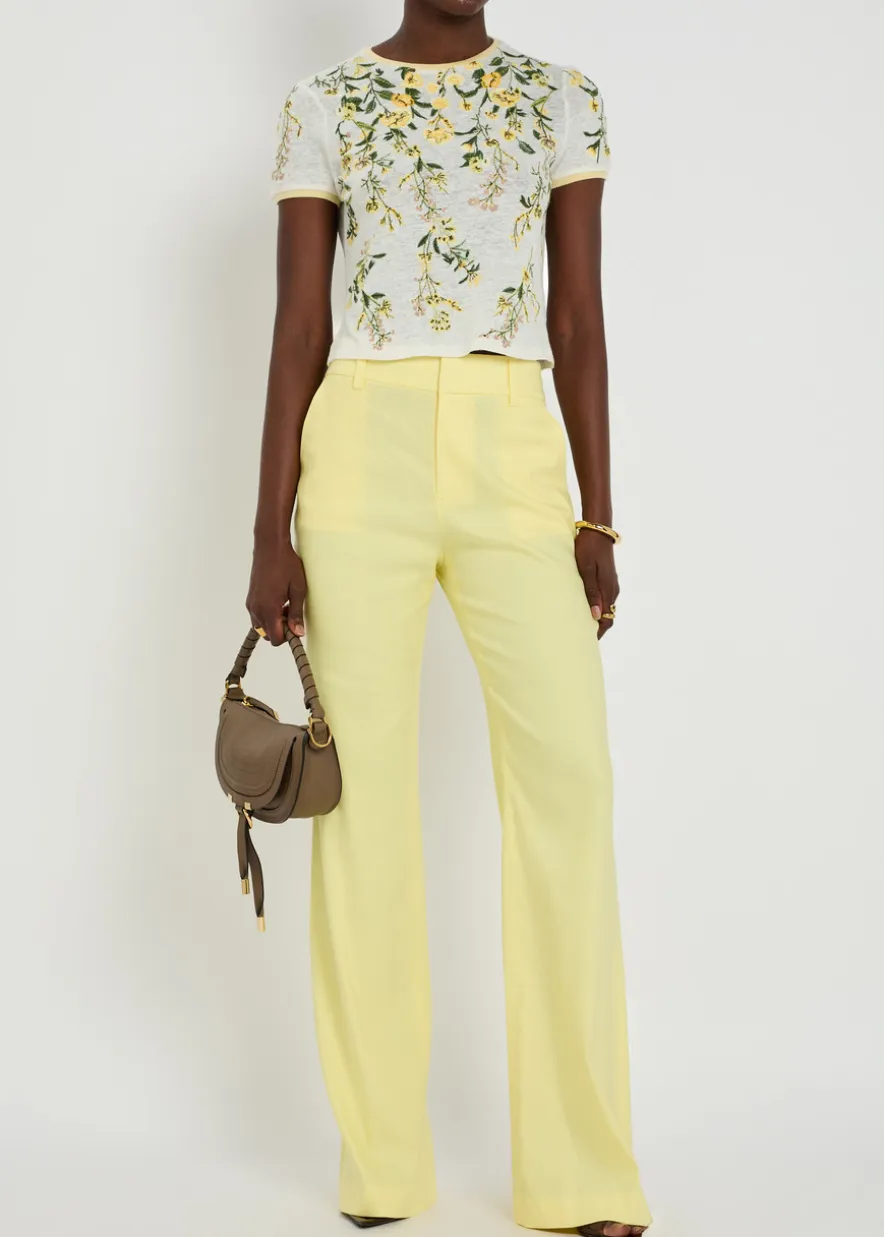 Lula flared-leg linen-blend trousers