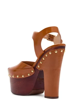 Meret 115 wood and glossed leather platform clogs