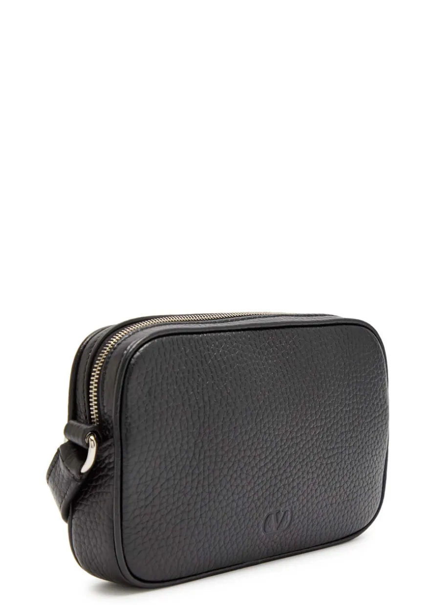 Mini stud-embellished grained leather cross-body bag