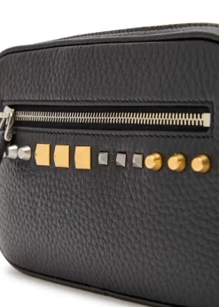 Mini stud-embellished grained leather cross-body bag