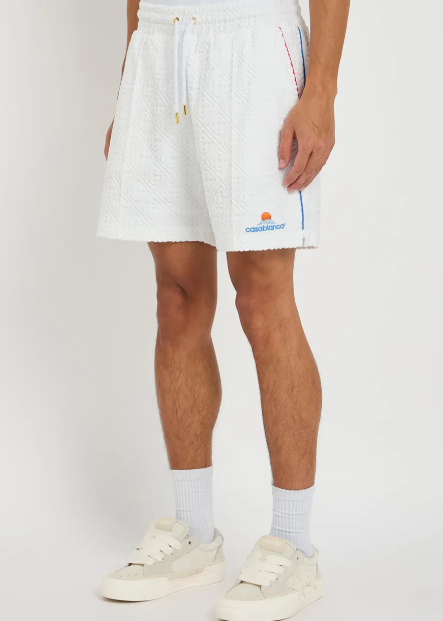 Monogram-jacquard towelling cotton-blend shorts