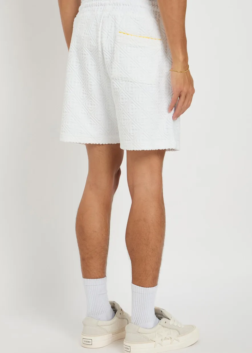 Monogram-jacquard towelling cotton-blend shorts