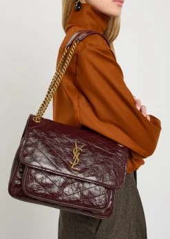 Niki medium patent leather shoulder bag