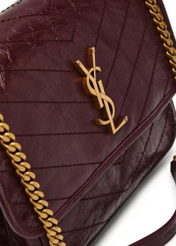 Niki medium patent leather shoulder bag