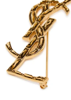 Opyum sculpted metal brooch
