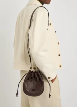 Perforated grained leather cross-body bag