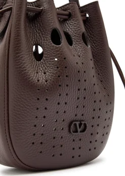 Perforated grained leather cross-body bag
