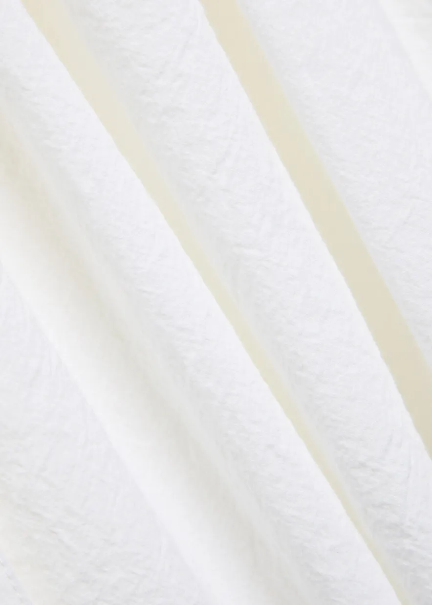 Pino textured cotton mini dress