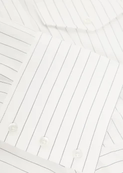 Pinstriped asymmetric cotton-poplin shirt