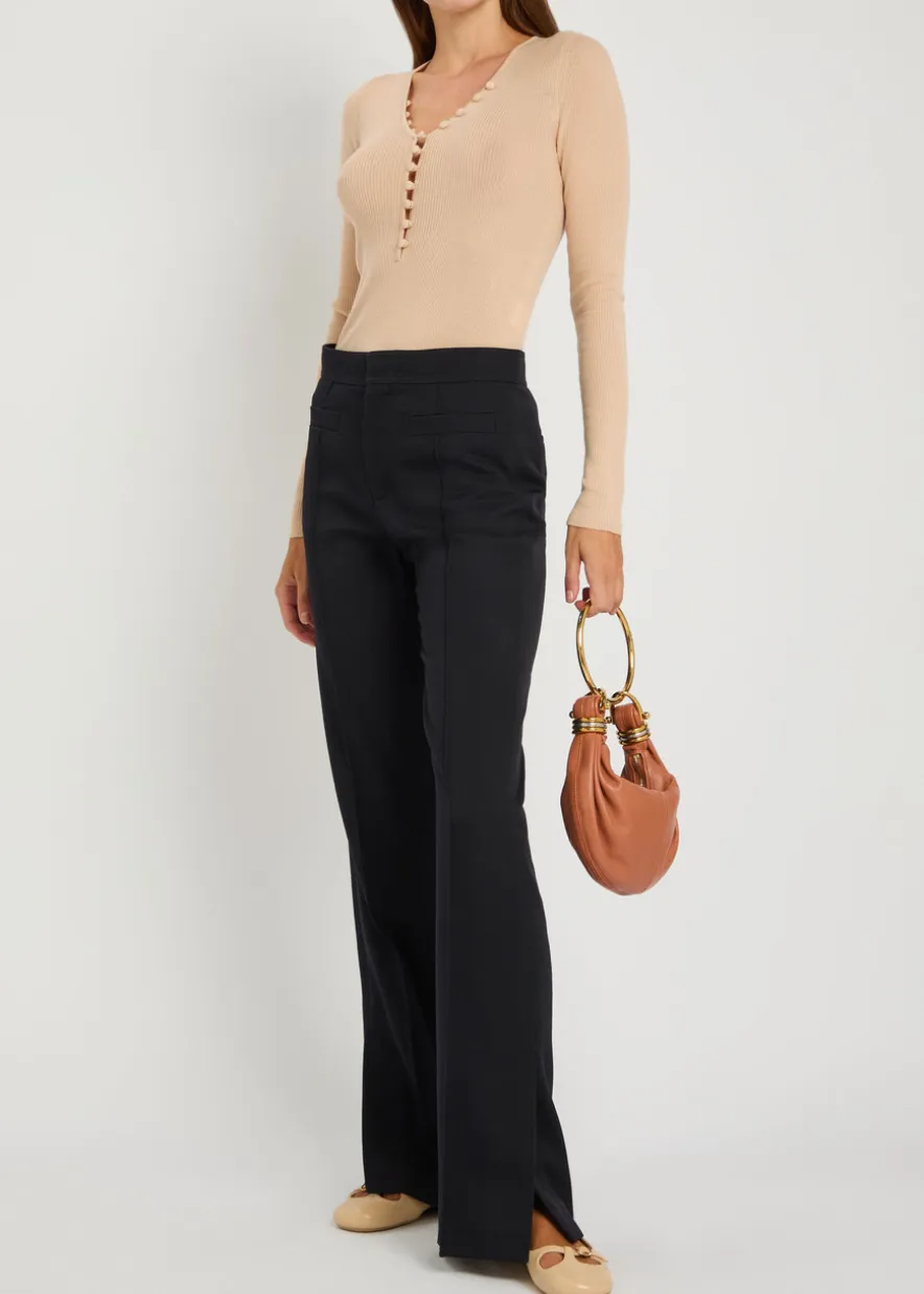 Pintuck flared-leg wool trousers