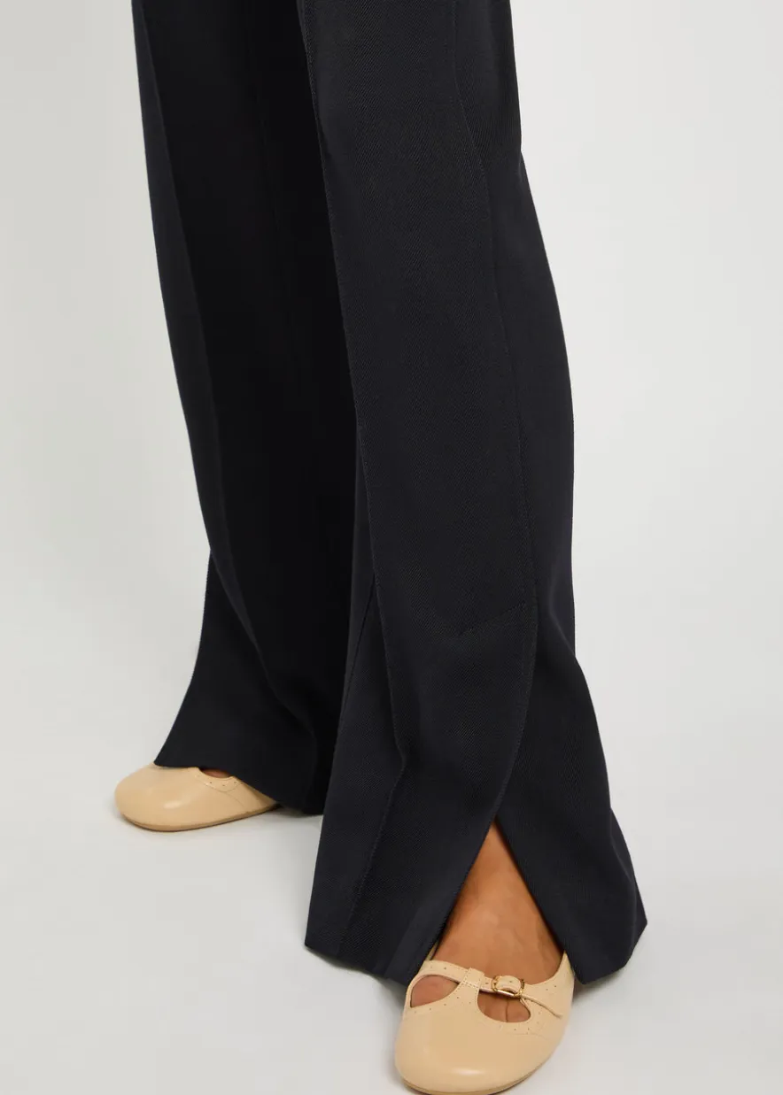 Pintuck flared-leg wool trousers