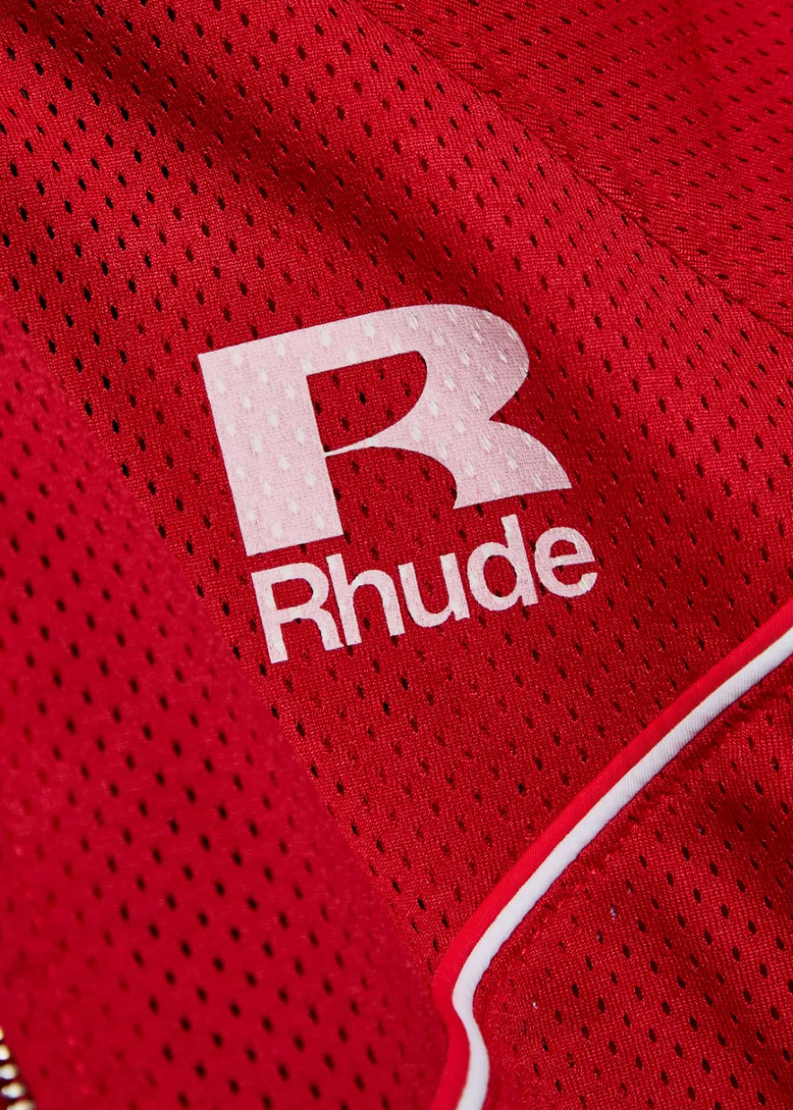 Pipe-trimmed mesh track jacket