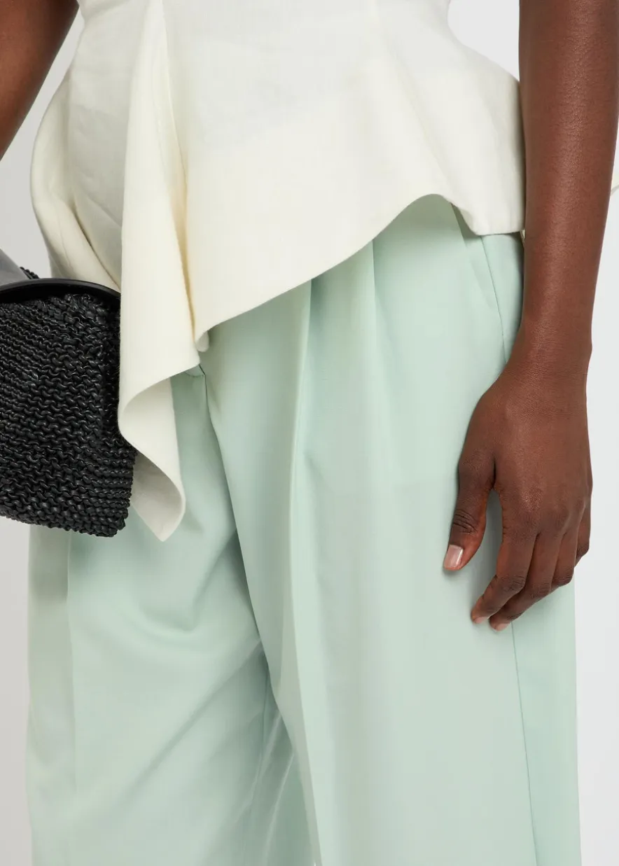 Pleated balloon-leg wool trousers