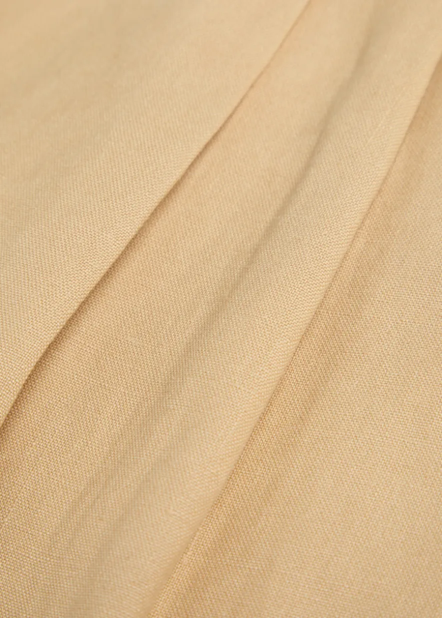 Pleated tapered-leg hemp trousers