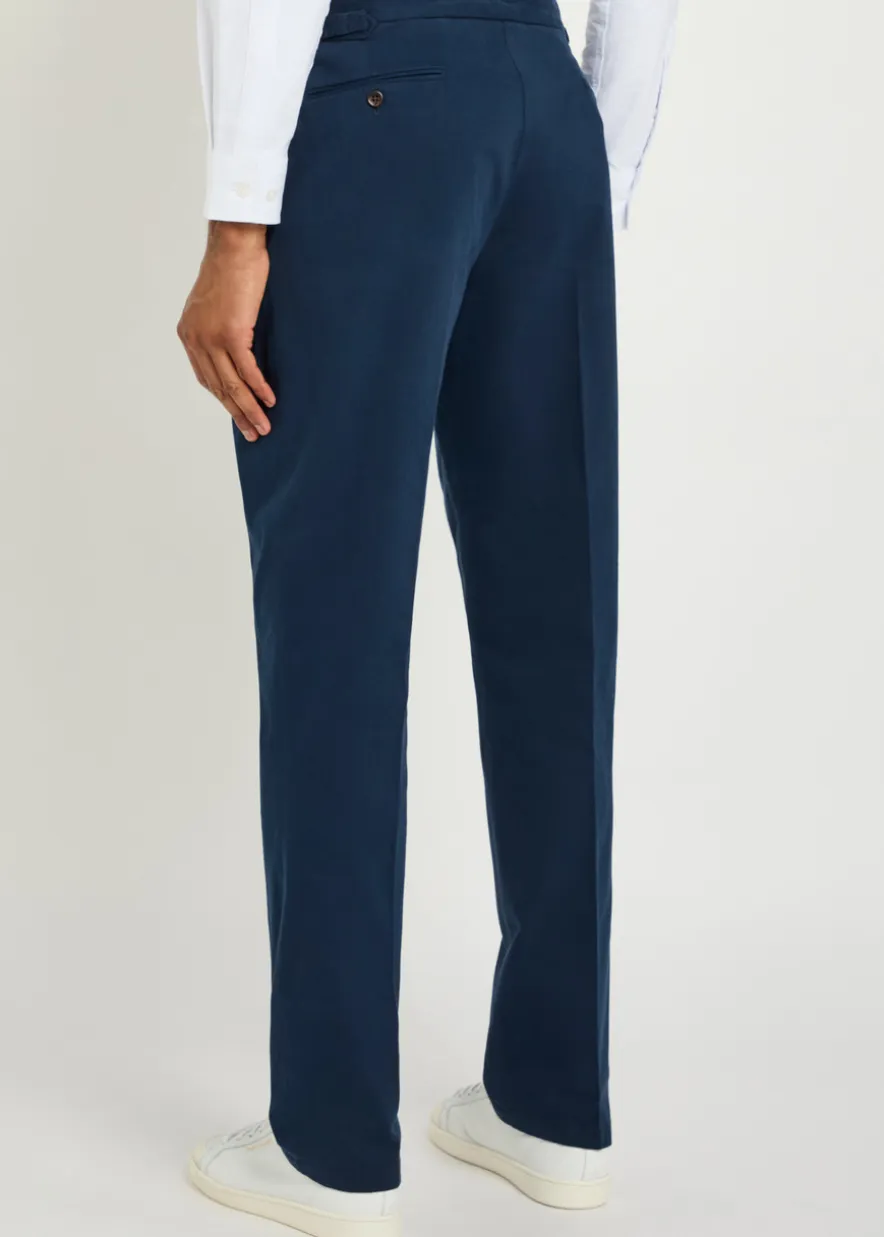 Pleated tapered-leg stretch-cotton trousers