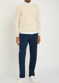 Pleated tapered-leg stretch-cotton trousers