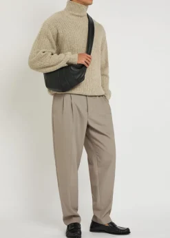 Pleated tapered-leg trousers