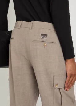 Pleated tapered-leg wool trousers